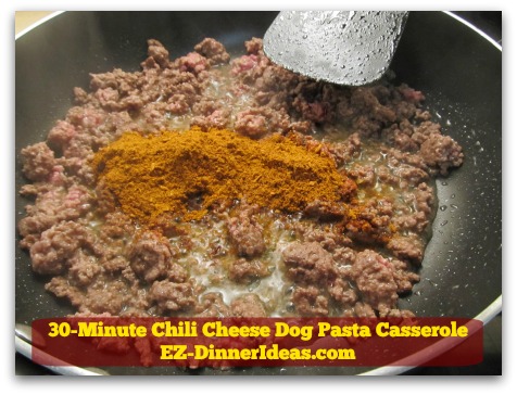 30-Minute Chili Cheese Dog Pasta Casserole - Stir in chili seasoning mix