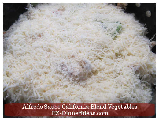 Adding cheese on top of mixture Adding cheese on top of mixture