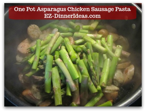 Chicken Sausage Recipe | One Pot Asparagus Chicken Sausage Pasta - Add asparagus spears into the skillet with the chicken sausage.