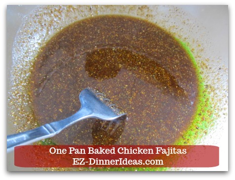 Easy Chicken Fajitas Recipe | One Pan Baked Chicken Fajitas - Whisk in extra virgin olive oil.  Marinade will look like paste.