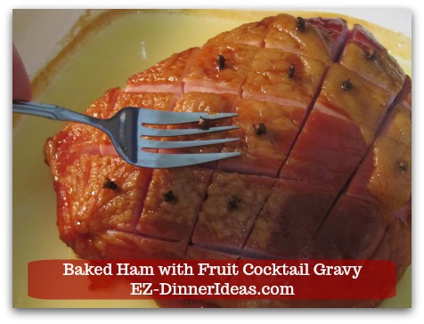Baked Ham Dinner Menu with Fruit Cocktail Gravy - Use a fork to remove the whole cloves one by one.  Use a spoon to push the clove out of the fork and discard.