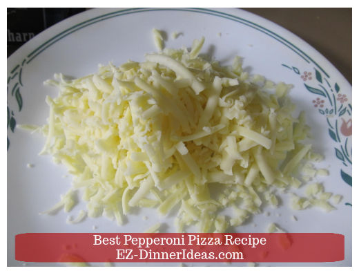 Shredded sharp cheddar cheese