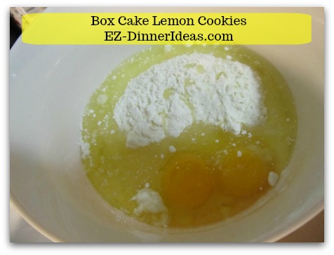 Lemon Cake Mix Cookies - Combine cake mix, oil, lemonade powder mix and eggs in a mixing bowl Lemon Cake Mix Cookies - Combine cake mix, oil, lemonade powder mix and eggs in a mixing bowl