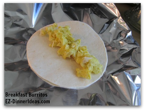 Breakfast Planning | Breakfast Burritos - Line eggs, sausage and cheese in the middle across of the tortilla. Breakfast Planning | Breakfast Burritos - Line eggs, sausage and cheese in the middle across of the tortilla.