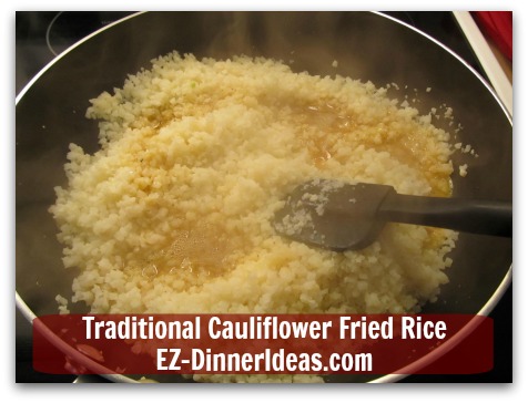 Traditional Cauliflower Fried Rice - When rice grains are hot, stir in egg mixture