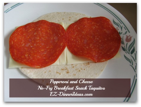 Pepperoni and Cheese No-Fry Breakfast Snack Taquitos - Skipped the sauce in the taquitos because I wanted to stay away from the mess.  Highly recommend you to use sauce for dipping only. Pepperoni and Cheese No-Fry Breakfast Snack Taquitos - Skipped the sauce in the taquitos because I wanted to stay away from the mess.  Highly recommend you to use sauce for dipping only.
