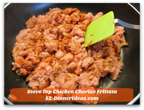 Stove Top Chicken Chorizo Frittata - Use spatula to break meat into bite size