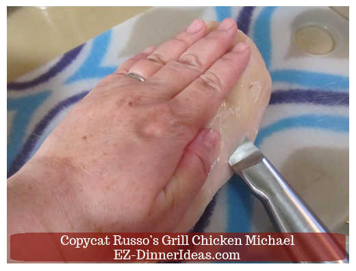 Slice chicken into halves Slice chicken into halves