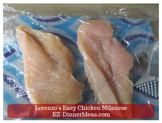 Chicken cutlets under plastic wraps Chicken cutlets under plastic wraps