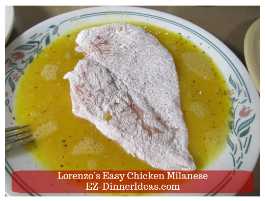 Coating chicken with egg wash Coating chicken with egg wash