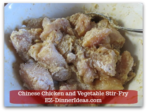 Chicken Stir-Fry Recipe | Chinese Chicken and Vegetable Stir-Fry - Toss to coat chicken with coating mixture.