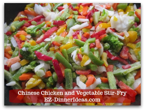 Chicken Stir-Fry Recipe | Chinese Chicken and Vegetable Stir-Fry - Add frozen stir-fried vegetables into the same skillet.