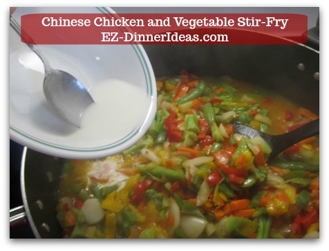 Chicken Stir-Fry Recipe | Chinese Chicken and Vegetable Stir-Fry - Stir in corn starch slurry to thicken the sauce.