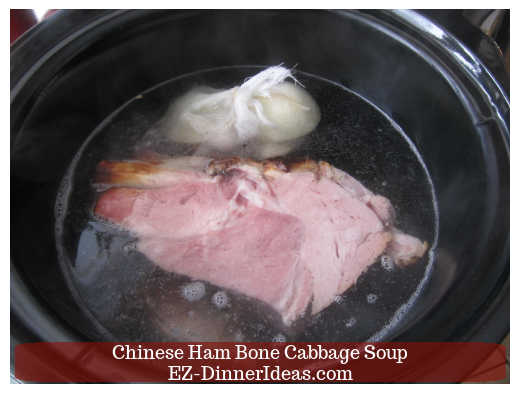 Hot boiling water into the slow cooker to make soup