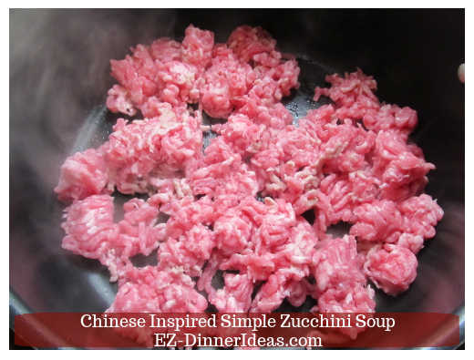 Brown and cut-up ground pork