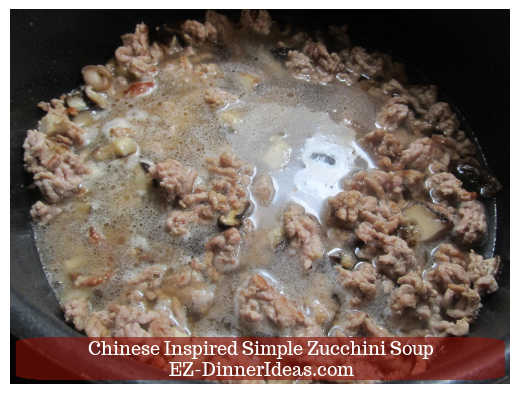 Adding in broth and mushroom water