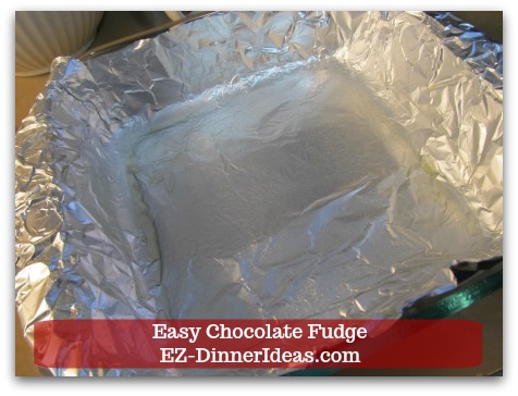 Easy Chocolate Fudge - Line a 8" square baking pan with aluminum foil and lightly coat it with cooking spray.