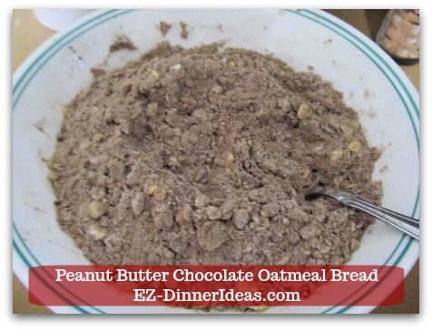 Great Breakfast Idea | Peanut Butter Chocolate Oatmeal Bread - Use a fork to stir and combine all dry ingredients and chocolate chips together. Great Breakfast Idea | Peanut Butter Chocolate Oatmeal Bread - Use a fork to stir and combine all dry ingredients and chocolate chips together.
