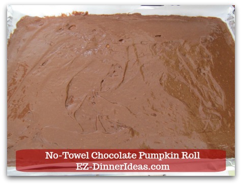 Chocolate Cake Roll | No-Towel Chocolate Pumpkin Roll - Pour in batter and spread it out evenly.