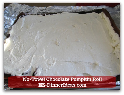 Chocolate Cake Roll | No-Towel Chocolate Pumpkin Roll - Spread cream filling evenly on top of the cake and roll cake lengthwise from your end towards the other.