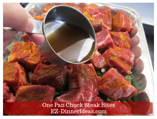 Adding beef stock into roasting pan Adding beef stock into roasting pan