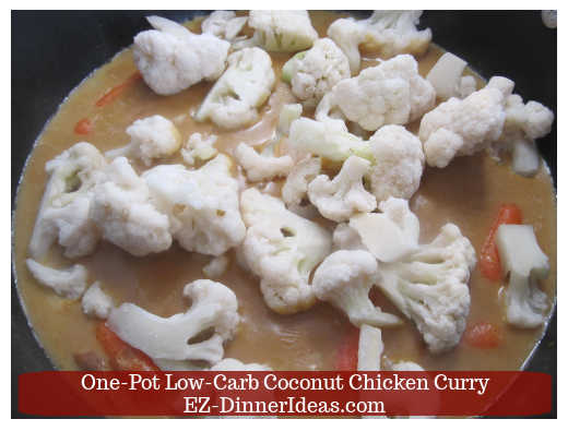 Cauliflower into the coconut curry mixture