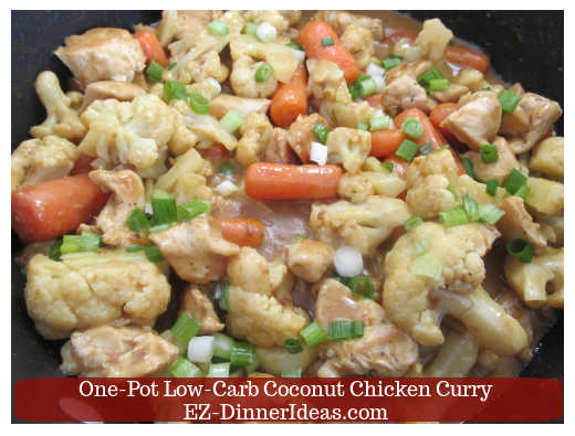 Coconut chicken curry garnished with scallions