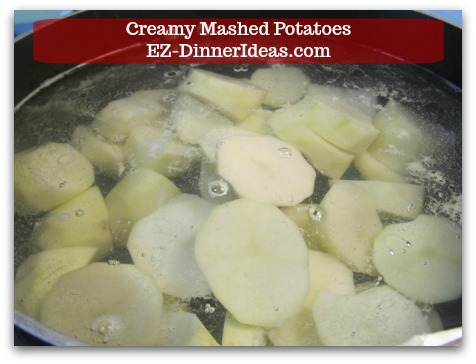 Creamy Mashed Potatoes - As soon as the potatoes are cut, they go into that pot of salty cold water.