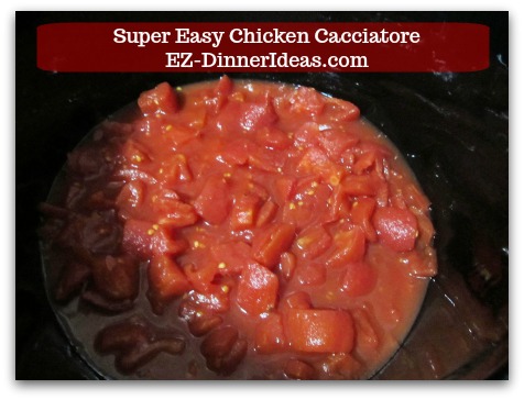 Italian Chicken Dinner Recipe | Super Easy Chicken Cacciatore - Add diced tomatoes with juice into a slow cooker.