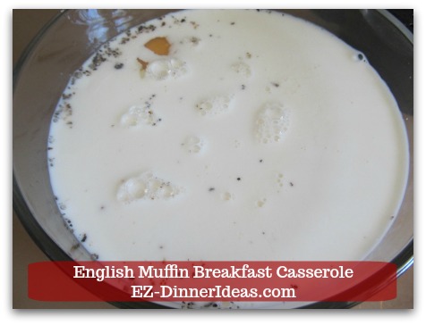English Muffin Breakfast Casserole - Add eggs, milk, dry Parsley flakes, salt and pepper in a big mixing bowl.