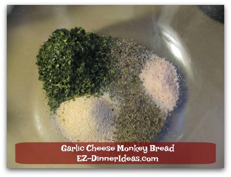 Garlic Cheese Monkey Bread - In a big mixing bowl, combine garlic powder, parsley, Italian seasonings, salt and pepper together