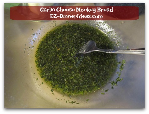 Garlic Cheese Monkey Bread - Whisk in extra virgin olive oil to form a thick paste