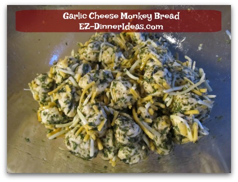 Garlic Cheese Monkey Bread - Add cheese and toss again