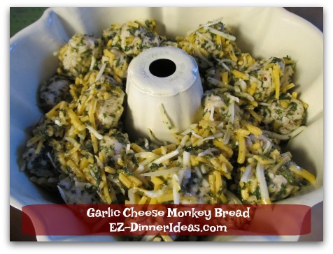 Garlic Cheese Monkey Bread - Transfer seasoned dough into the bundt pan and bake for 20-30 minutes.