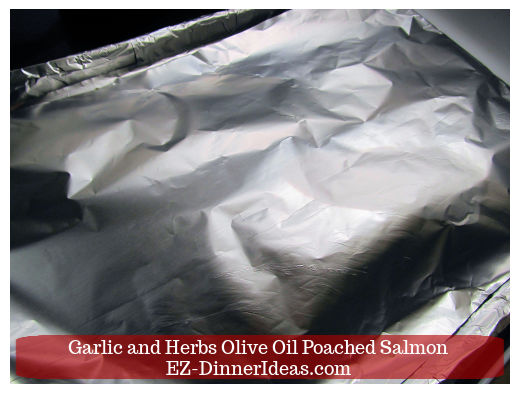Salmon covered under foil Salmon covered under foil