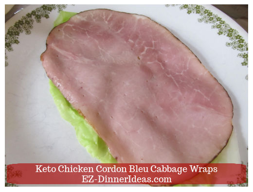 Adding ham on top of cabbage Adding ham on top of cabbage