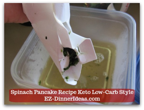 Spinach Pancake Recipe Keto Low-Carb Style - Squeeze it hard and drip the liquid out of the box.  See how clear the liquid is.  There is barely spinach wasted and no kitchen towel is needed.