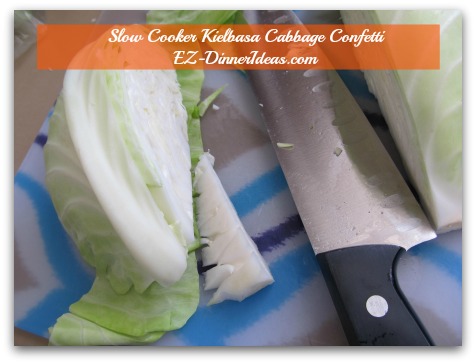 Cabbage Dinner Recipe | Slow Cooker Kielbasa Cabbage Confetti - Slightly tilt your knife to cut out the core from a quarter of the cabbage
