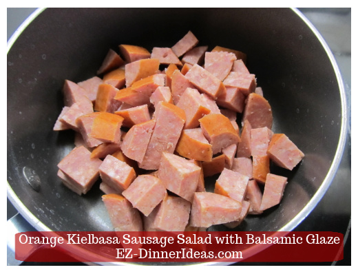 Brown sausage in a medium sauce pan