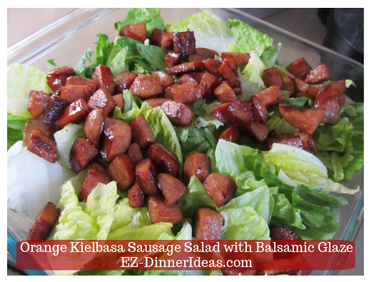 Sausage on top of lettuce