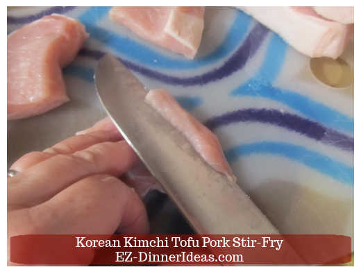 Thinly slicing the pork