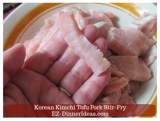 Sliced meat showing the grains to make tender pork later