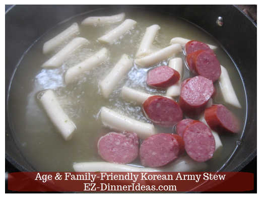 Rice sticks and kielbasa cooking