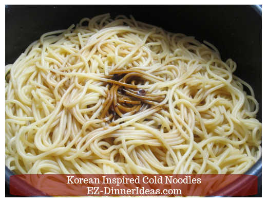 Mixing seasonings with spaghetti