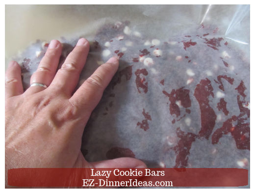 Gently press dough covered with wax paper