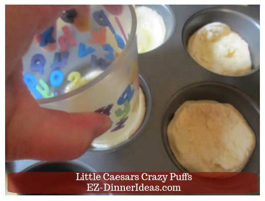 Spreading dough out into cup shape