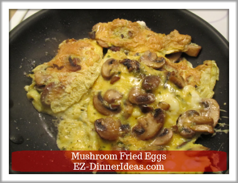 Mushroom Fried Eggs - Top is still wet.  Turn it over