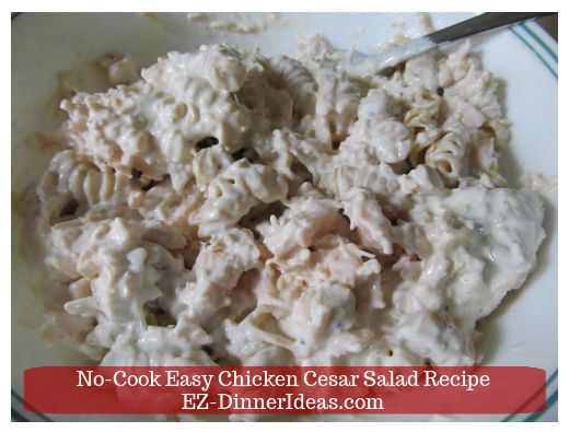 Folding pasta into chicken salad