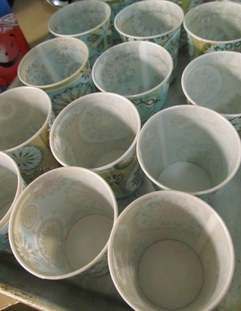 Line the cups in a 2-inch deep baking sheet Line the cups in a 2-inch deep baking sheet