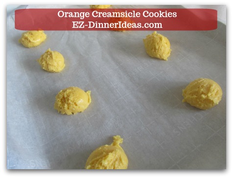 Easy Cake Mix Cookies Recipe | Orange Creamsicle Cookies - Use a small ice-cream scoop and transfer cookie dough to a parchment-paper-lined baking sheet.